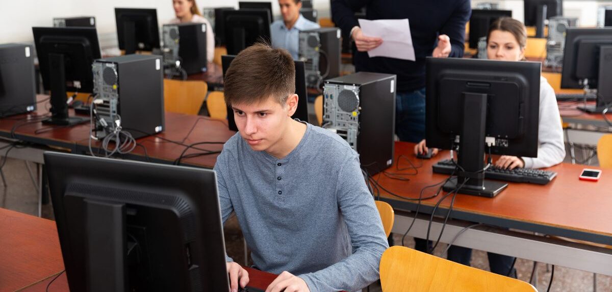a class of computer lesson with teacher